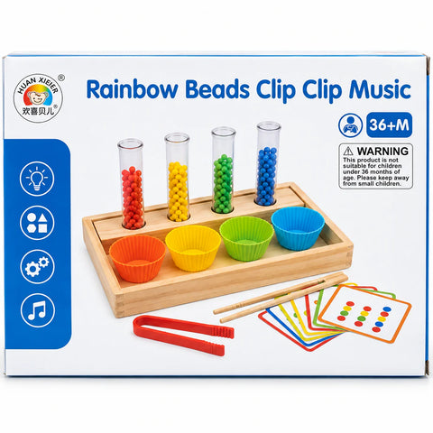 علبة Rainbow Beads Clip Clip Music عليها أنابيب الخرز والكوبايات والملقاط والكروت، ومكتوب عليها 36+ شهر مع تحذير